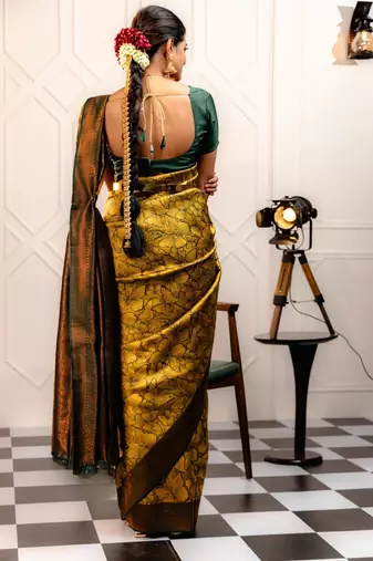 yellow silk blend banarasi saree with unstitched blouse piece