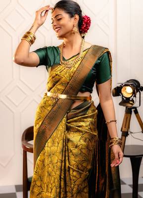 yellow silk blend banarasi saree with unstitched blouse piece 1