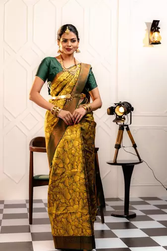 yellow silk blend banarasi saree with unstitched blouse piece