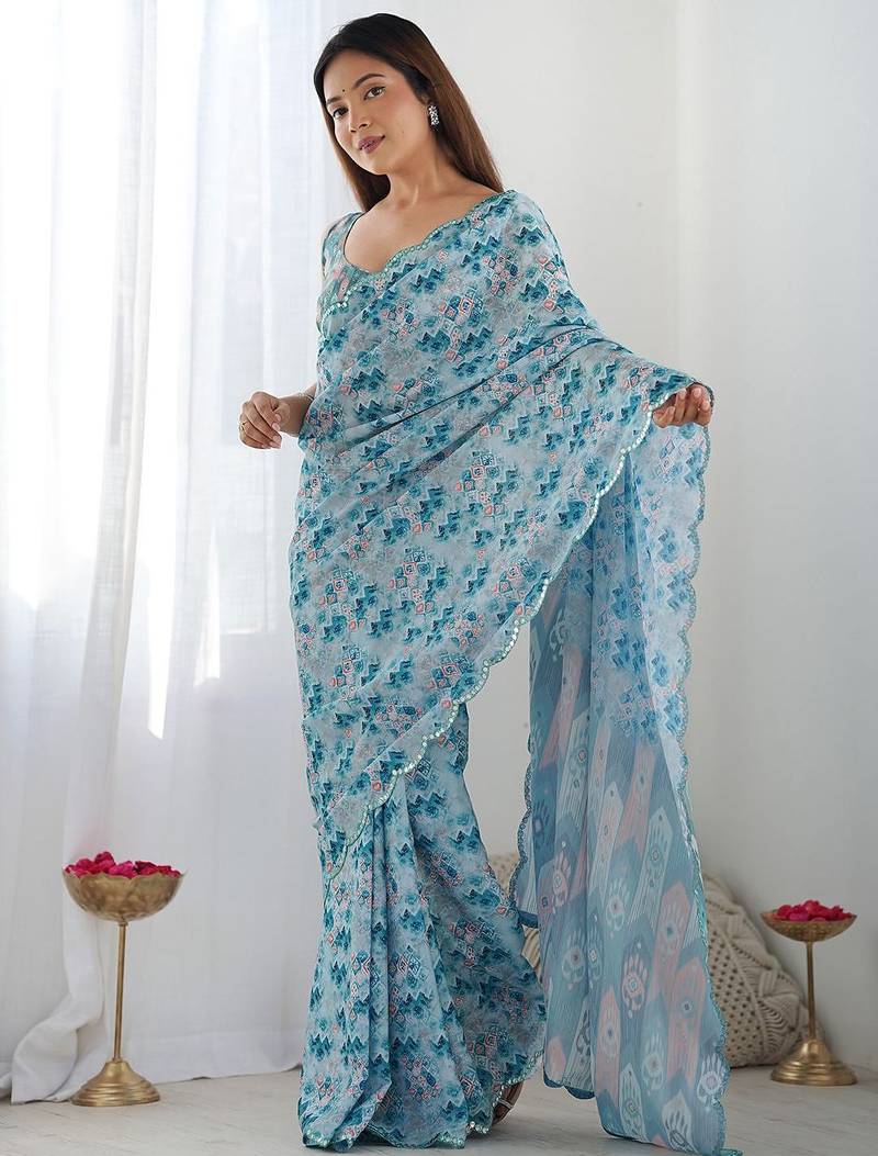skyblue georgette printed mirror lace work saree