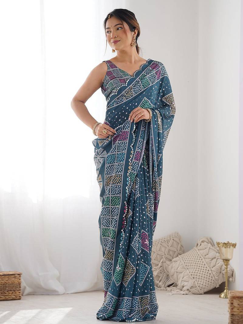 tealblue georgette printed mirror lace work saree