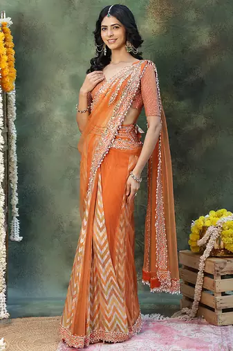 Rust orange embroidered silk saree