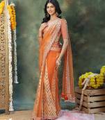 Rust orange embroidered silk saree