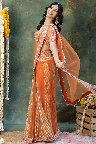 Rust orange embroidered silk saree