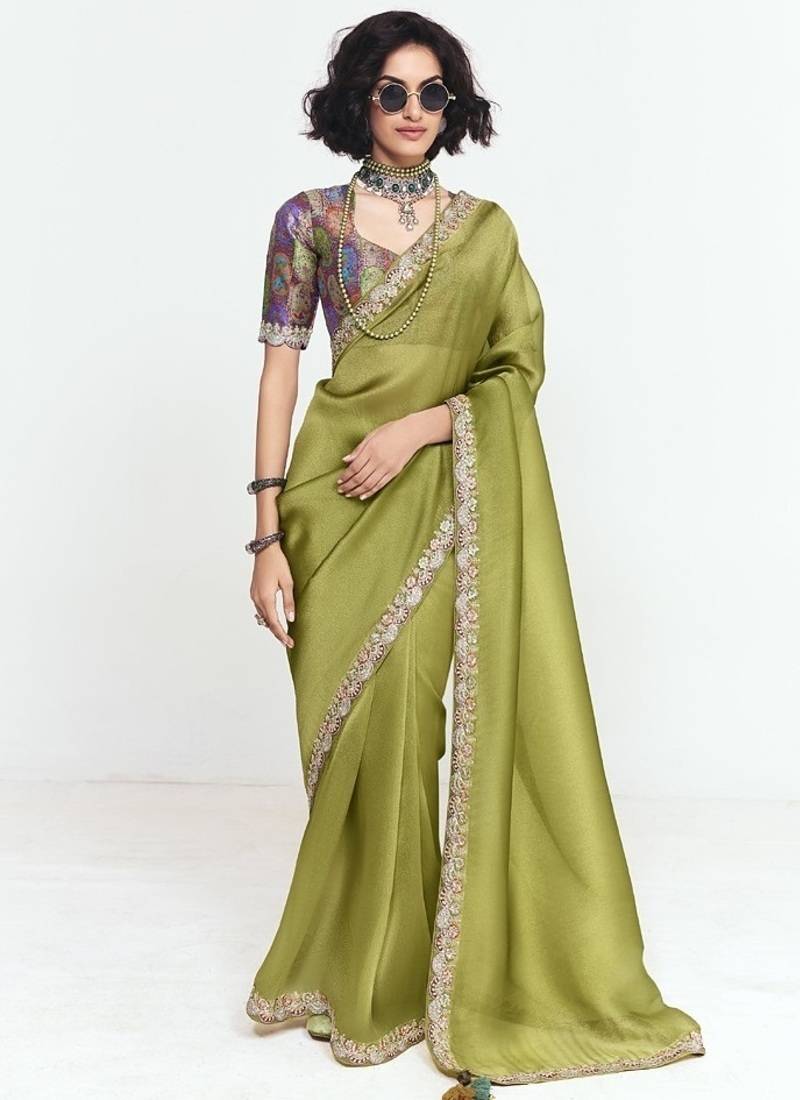 Olive fancy beautified with sequins ,dhaga ,thread embroidered work saree