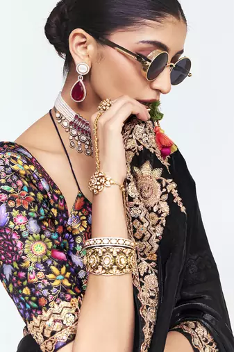 Black fancy beautified with sequins dhaga thread embroidered work saree