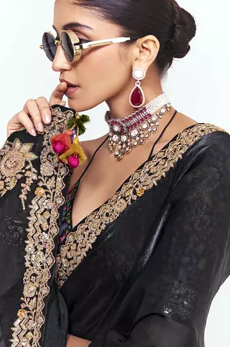 Black fancy beautified with sequins dhaga thread embroidered work saree