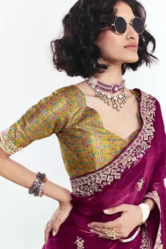 Maroon fancy beautified with sequins dhaga thread embroidered work saree