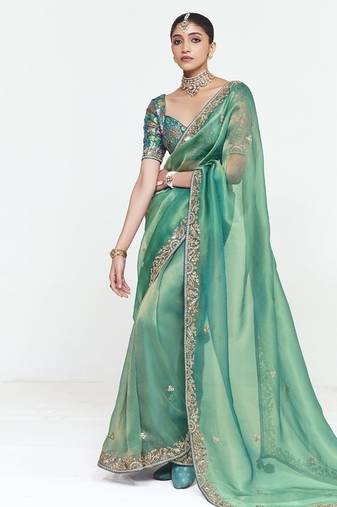 Turquise fancy beautified with sequins dhaga thread embroidered work saree