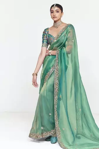 Turquise fancy beautified with sequins ,dhaga ,thread embroidered work saree