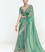 Turquise fancy beautified with sequins ,dhaga ,thread embroidered work saree