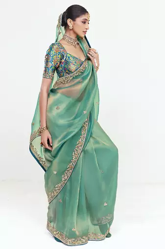 Turquise fancy beautified with sequins dhaga thread embroidered work saree