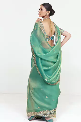Turquise fancy beautified with sequins dhaga thread embroidered work saree