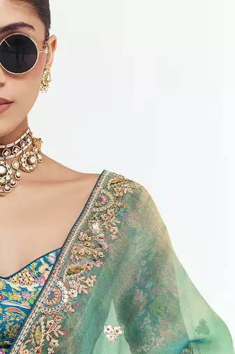 Turquise fancy beautified with sequins dhaga thread embroidered work saree