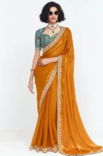 Orange fancy beautified with sequins ,dhaga ,thread embroidered work saree
