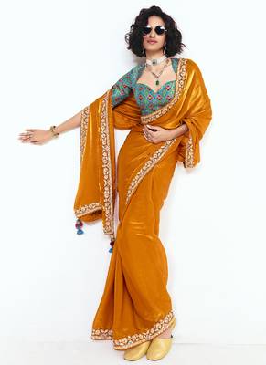 Orange fancy beautified with sequins dhaga thread embroidered work saree 2