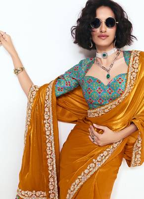 Orange fancy beautified with sequins dhaga thread embroidered work saree 3