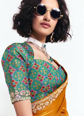 Orange fancy beautified with sequins dhaga thread embroidered work saree 4