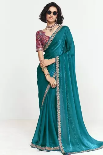 Teal fancy beautified with sequins ,dhaga ,thread embroidered work saree