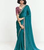 Teal fancy beautified with sequins ,dhaga ,thread embroidered work saree