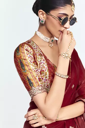 Red fancy beautified with sequins dhaga thread embroidered work saree