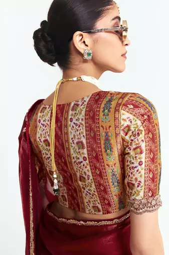 Red fancy beautified with sequins dhaga thread embroidered work saree