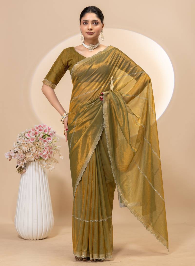 Gold twill net saree with siroski work and blouse