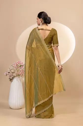 Gold twill net saree with siroski work and blouse