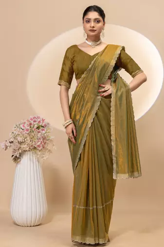 Gold twill net saree with siroski work and blouse