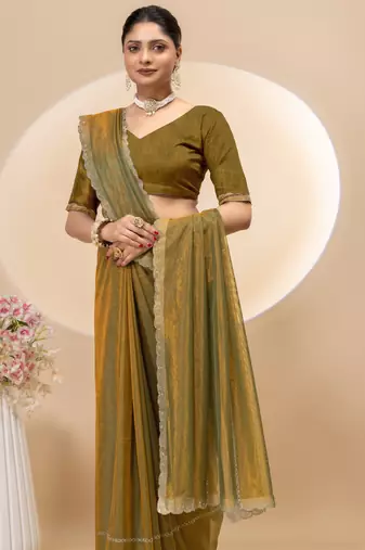 Gold twill net saree with siroski work and blouse