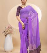 Purple georgette saree with siroski work and bandhni print pallu and blouse