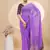 Purple georgette saree with siroski work and bandhni print pallu and blouse
