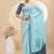 Sky blue georgette saree with siroski work and bandhni print pallu and blouse
