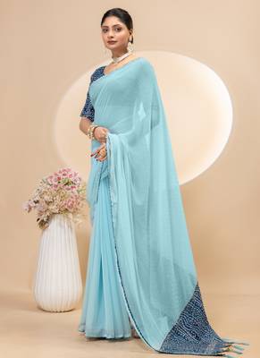 Sky blue georgette saree with siroski work and bandhni print pallu and blouse 4
