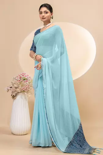 Sky blue georgette saree with siroski work and bandhni print pallu and blouse
