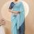 Sky blue georgette saree with siroski work and bandhni print pallu and blouse
