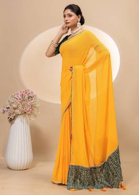 Yellow georgette saree with siroski work and bandhni print pallu and blouse 2