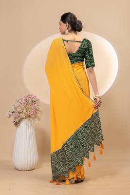Yellow georgette saree with siroski work and bandhni print pallu and blouse 3