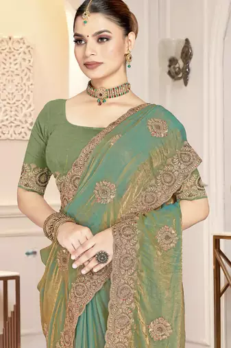 Green color heavy coding zarkan embroidered work satin silk saree sari