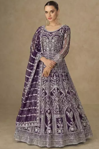 Designer wedding wear net anarkali suit for women purple color