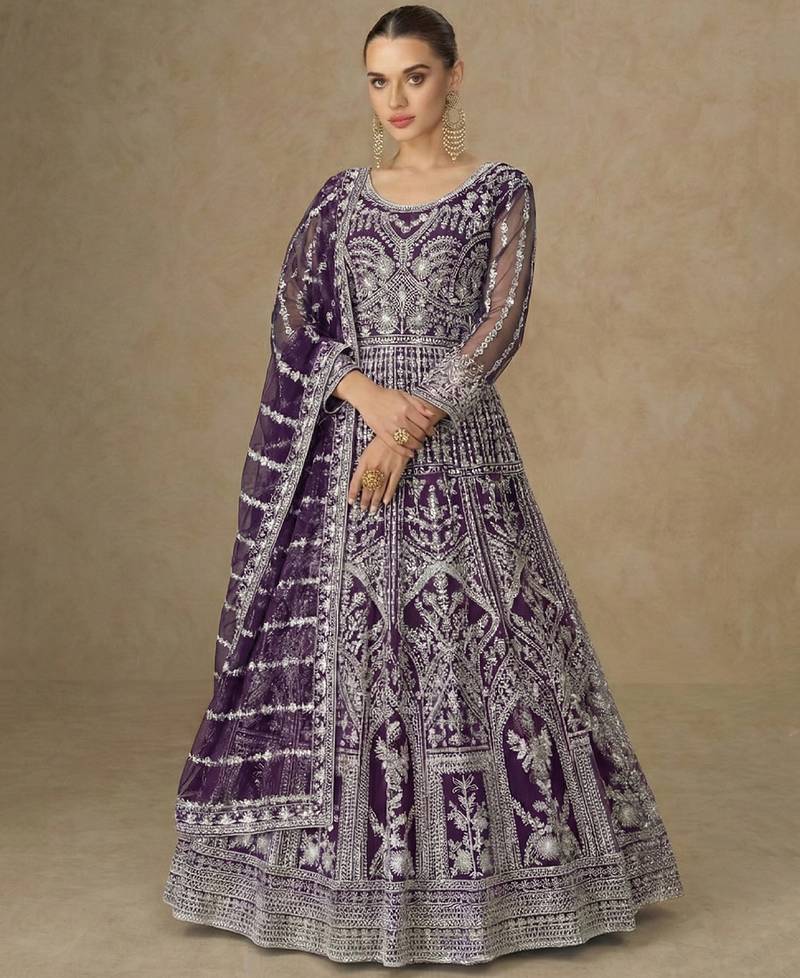 Designer wedding wear net anarkali suit for women purple color