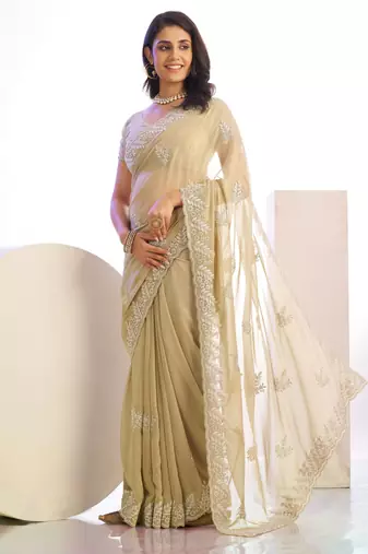 chiku color stylish heavy partywear saree for rich girlie looks