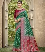 green color banarasi silk blend fabric ethnic woven designer saree