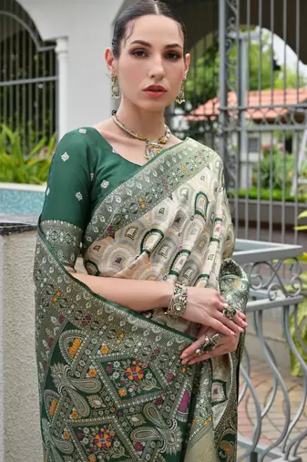 green woven partywear saree