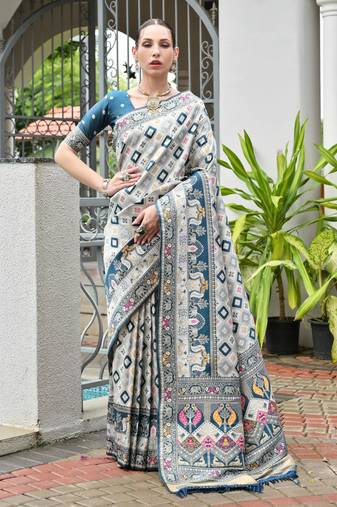 rama color beautiful woven designer partywear saree