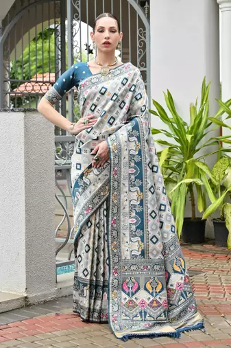 rama color beautiful woven designer partywear saree