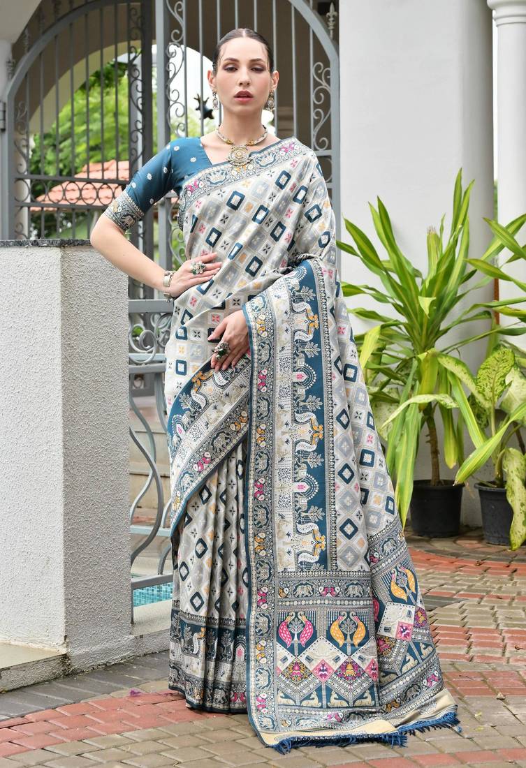 rama color beautiful woven designer partywear saree