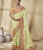 light green embroidered jacquard silk blend wedding saree with blouse fabric