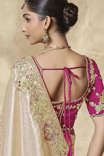 gold embroidered jacquard silk blend wedding saree with blouse fabric