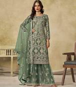 Green net heavy thread embroidery with sequins work palazzo suit